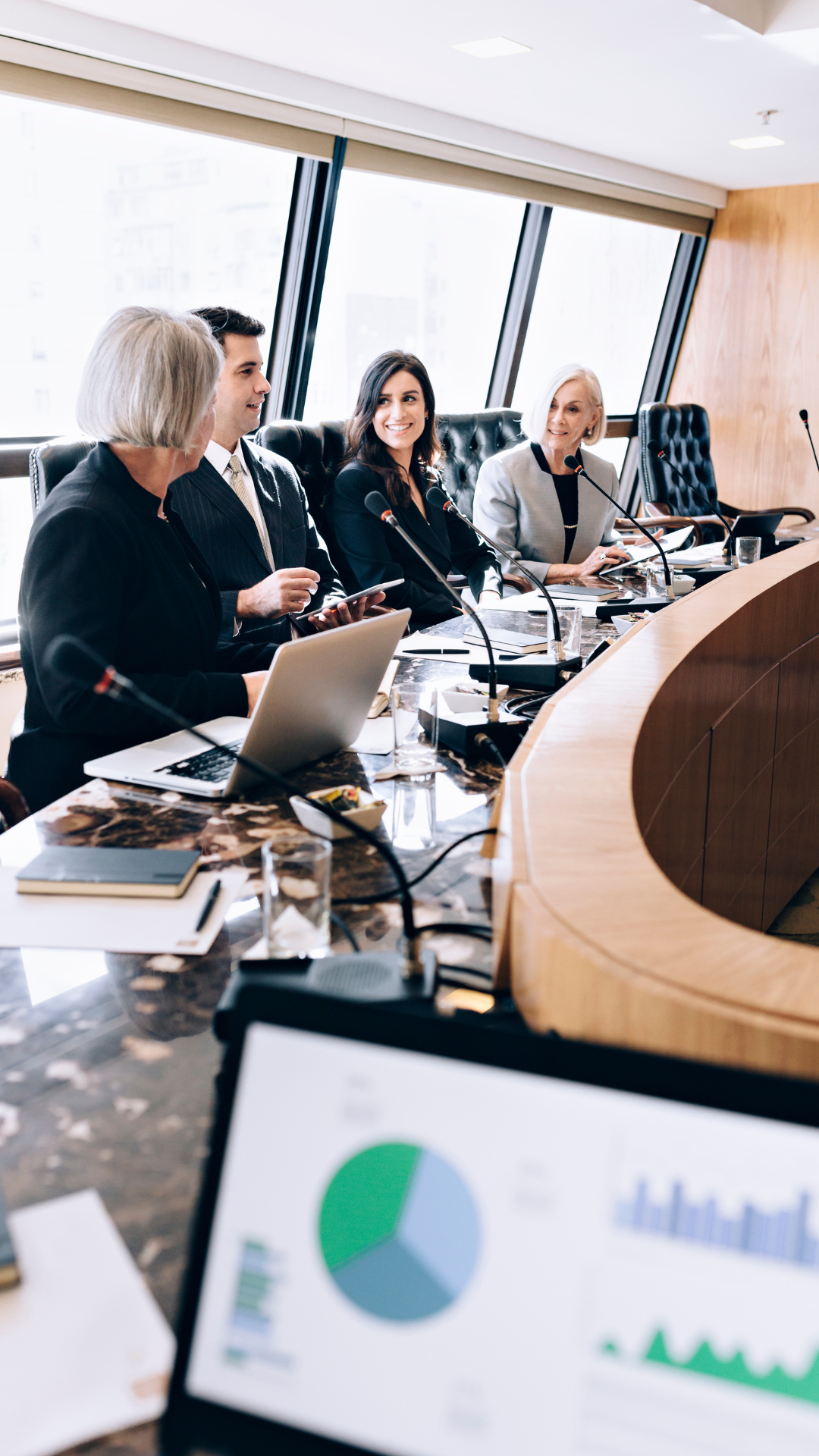 group of professionals collaborating in a meeting room